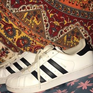 Black and white adidas super stars size 9